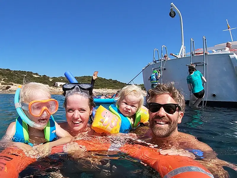Ibiza Family Boat Trip with Paella Lunch and Snorkeling from Sant Antoni