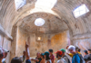 The Tour Guy tour group inside a structure in Pompeii