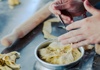 Tzatziki sauce being prepared