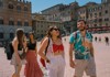 A group of tourists walking through Siena while on tour with The Tour Guy.