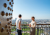 A tour guide explaining the history of the Eiffel Tower to a group on tour with The Tour Guy.
