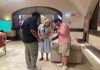 Two tourists inside the Borghese Gallery with their guide from The Tour Guy.