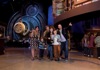 Family of 5 pointing around at the Warner Bros Studios in London