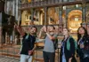 A group of tourists inside St. Mark's Basilica with a guide from The Tour Guy.