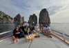 Boat with Capri Rocks in Background