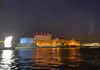 Lisbon waterfront buildings illuminated along the Tagus River