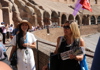 A tourist walking through the Colosseum along with a guide from The Tour Guy.