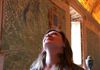A tourist inside the Hall of Maps.