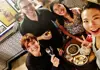 Group enjoying tapas and drinks during a Málaga wine tour