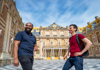 A tour guide at the meeting point Porte d'Auteuil Metro Station for the start of the Ultimate Palace of Versailles Tour from Paris with The Tour Guy.