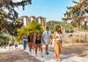 guide and group walking near the acropolis