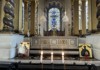 A candlelit display inside St. Paul's Cathedral in London.