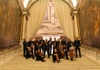 Intepreti Veneziani music ensemble posing on marble stairs