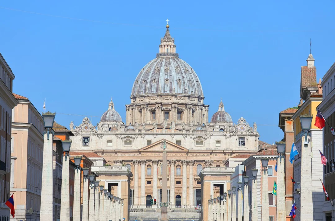 Private Vatican Museums, Sistine Chapel, St. Peters and Dome Climb Tour guide and group in pinecone courtyard