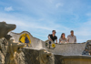 A woman looking at Bridges in Park Guell in Barcelona