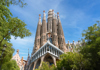 A group of tourists in front of the Sagrada Familia with their guide from The Tour Guy.