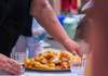 A couple enjoying their food while on a tour with The Tour Guy.