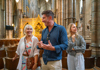 A group of tourists inside Westminster Abbey with a guide from The Tour Guy.