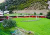 PTR FV Bern Exp Bernina Express on motion with mountains view