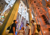 A woman taking a selfie inside the Sagrada Familia.