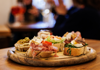 Plate of cicchetti (Italian tapas) with various tastes