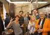 Food tour group posing inside a traditional tapas bar
