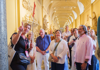 Small group admiring artwork inside the Vatican Museums