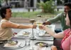 Women sitting at a table in a restaurant in Florence enjoying various Italian meats and wine.