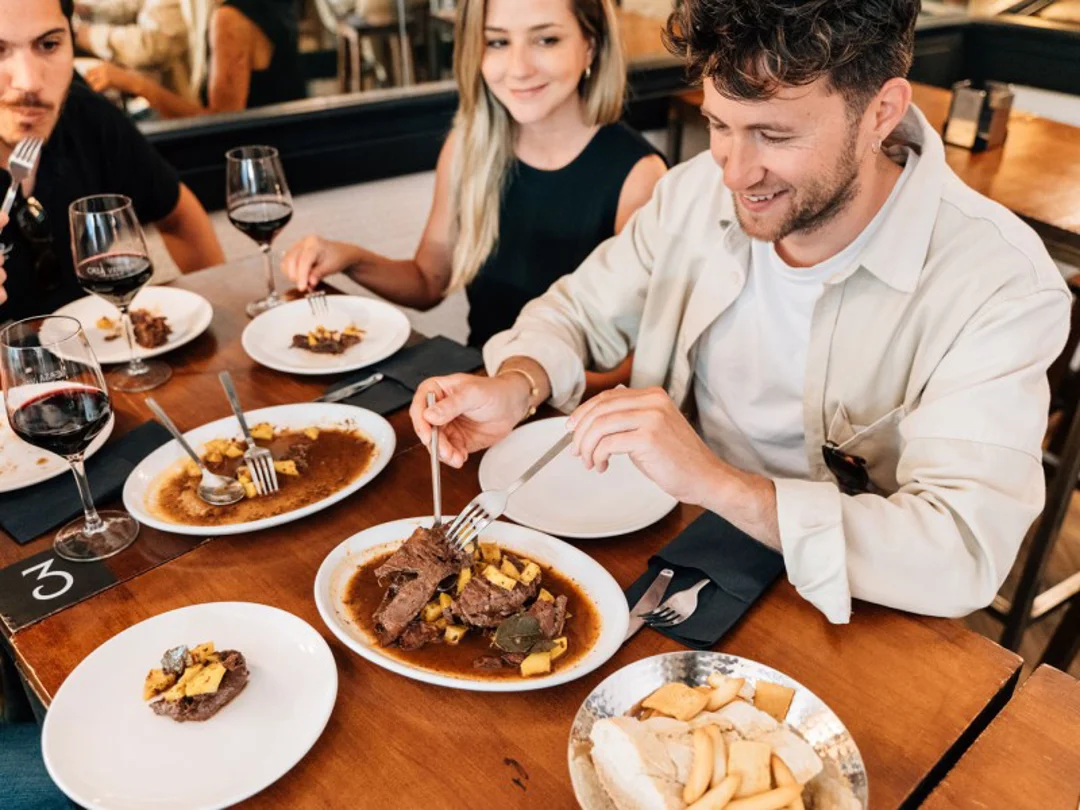 couple eating sandwiches