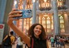 A woman taking a selfie inside the Sagrada Familia.