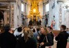 A photo of customers looking at St. Peter's Chair inside of St. Peter's Basilica in Italy while on tour with The Tour Guy. 