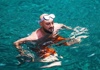 Man snorkeling in the sea in Ponza