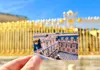 Palace of Versailles ticket with golden gates behind