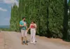 A tourist meeting their tour guide before entering a van with The Tour Guy.
