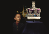 young boy gazing at a crown in the Jewel House