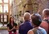 A group of tourists on tour of the Colosseum Underground.