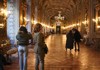 Tourists inside the Pamphili Gallery in Rome, Italy.