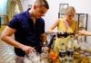 A couple preparing spritz during a cooking class in Rome