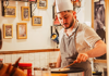 Chef making a crepe during a Paris food tour