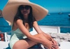 Woman in a swimsuit on a boat in Ponza