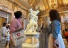 Two tourists inside the Borghese Gallery with their guide from The Tour Guy.