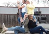 Group pointing at winery