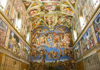 A group of tourists walking through the Pinecone Courtyard in the Vatican Museums while on tour with The Tour Guy.