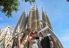 A group of tourists infront of the Sagrada Familia with their guide from The Tour Guy.
