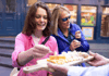 Two tourists tasting cheese while on a food tour in London with The Tour Guy.