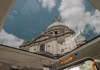 An image of St. Paul's Cathedral in London viewed inside of a traditional black cab.