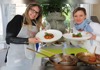 2 women with plates
