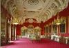 An image of the State Dining Rooms inside Buckingham Palace.
