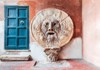 An image of The Mouth of Truth in Rome. 