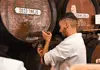 Wine poured from a barrel in a traditional Andalusian cellar